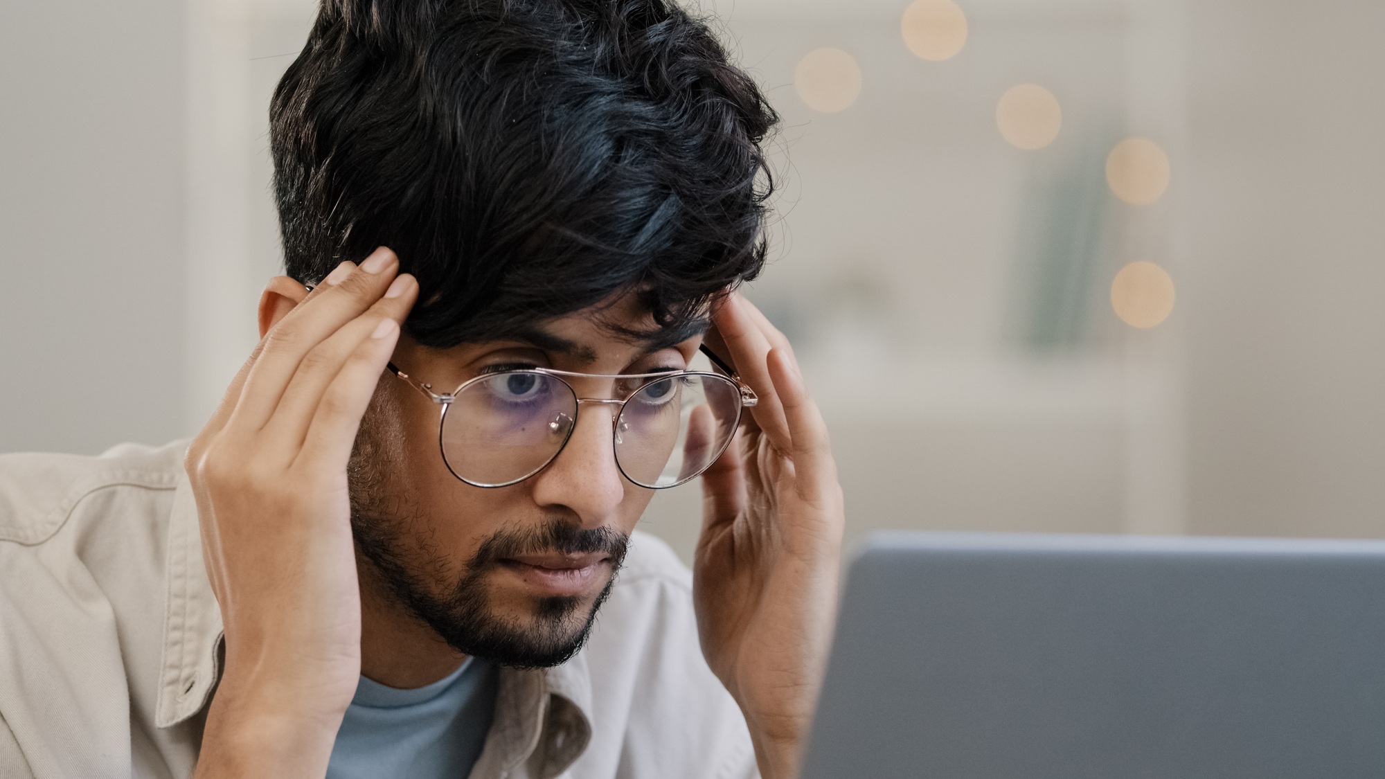 Close-up arab business man student male bearded boss leader with glasses guy works with laptop